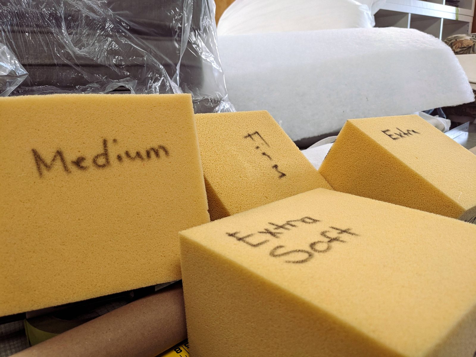 Foam blocks labeled soft, medium, firm and extra firm
